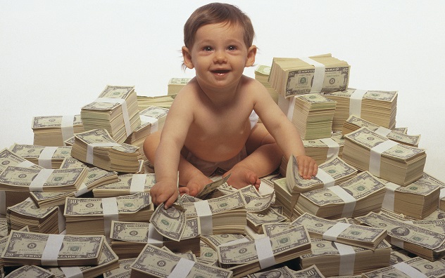Baby sitting on pile of money