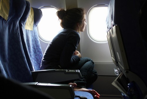 Girl-Looking-Out-of-Window